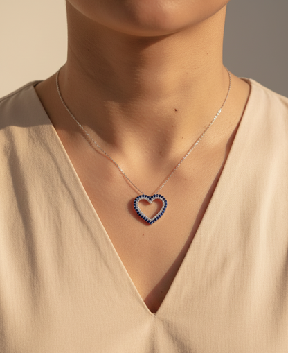 Blue sapphire and diamond heart pendant in 18K white gold, 1.23 ct sapphires, 0.37 ct diamonds, luxury fine jewelry by Emirates Diamonds