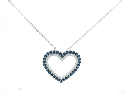 Blue sapphire and diamond heart pendant in 18K white gold, 1.23 ct sapphires, 0.37 ct diamonds, luxury fine jewelry by Emirates Diamonds