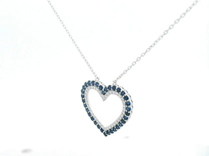 Blue sapphire and diamond heart pendant in 18K white gold, 1.23 ct sapphires, 0.37 ct diamonds, luxury fine jewelry by Emirates Diamonds