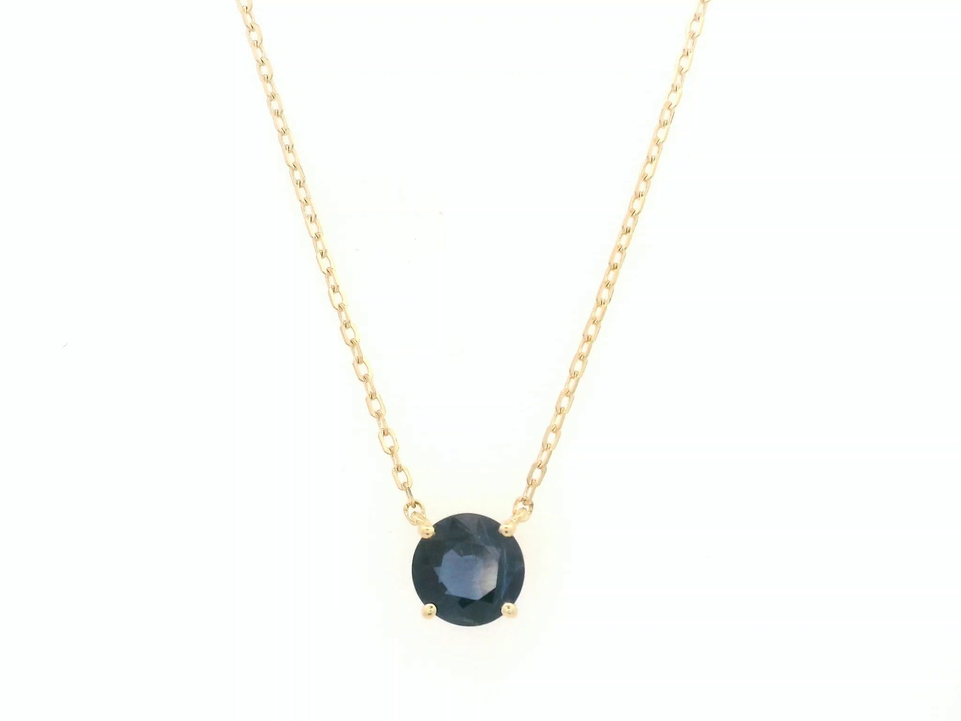 Round blue sapphire solitaire necklace in 18K yellow gold by Emirates Diamonds