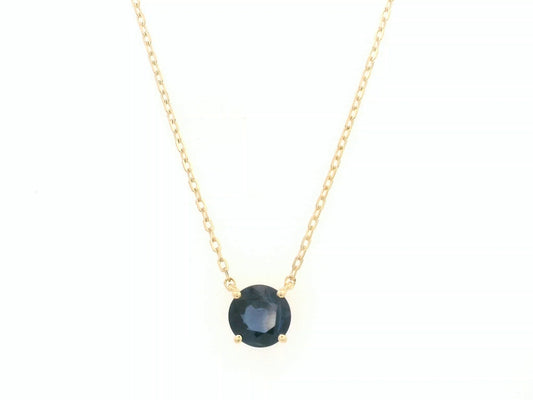 Round blue sapphire solitaire necklace in 18K yellow gold by Emirates Diamonds