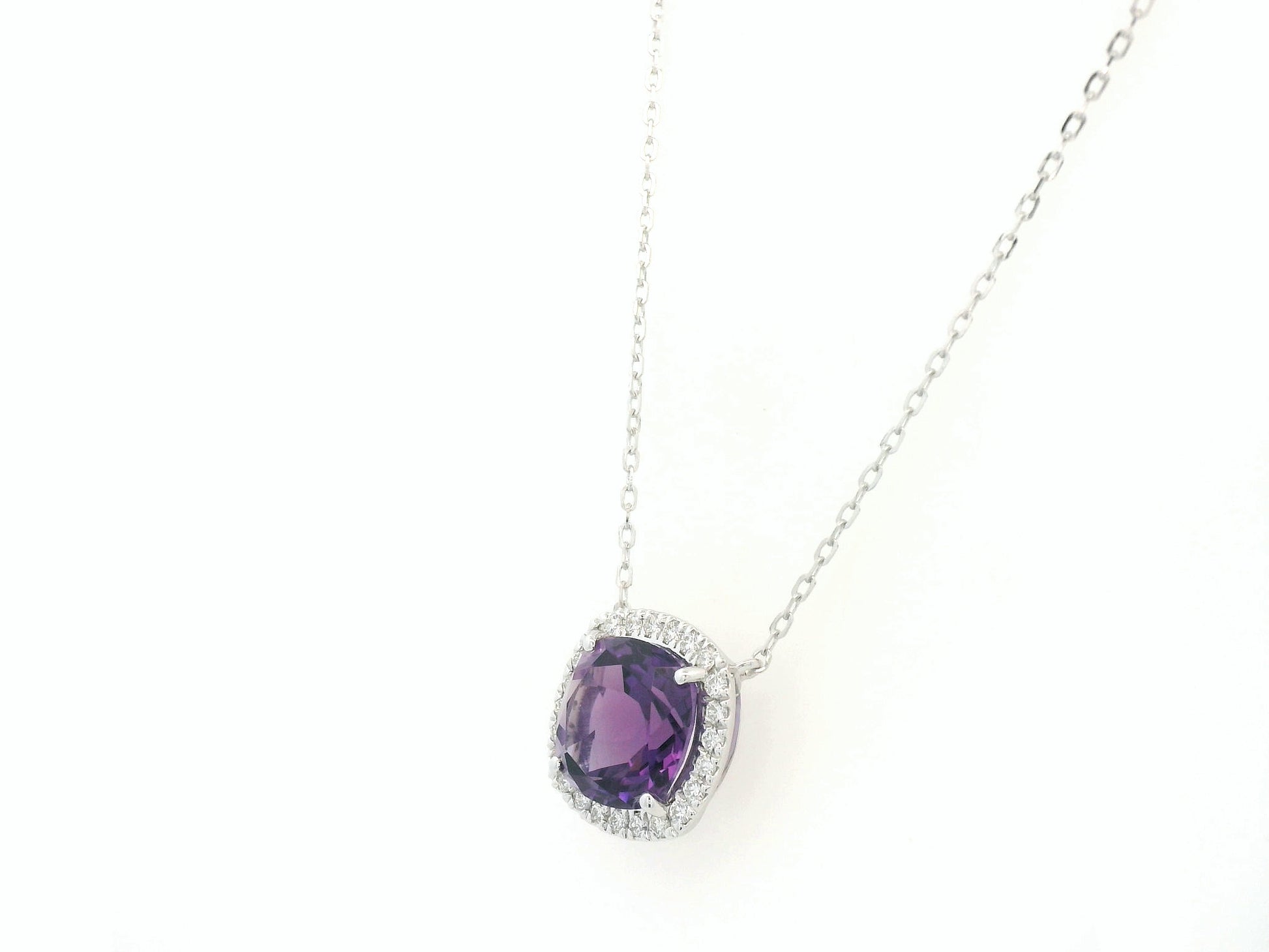 Cushion cut amethyst and diamond halo necklace in 18K white gold by Emirates Diamonds