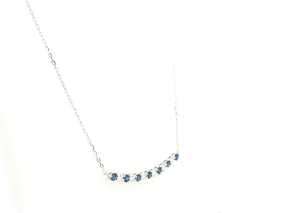 Blue sapphire and diamond bar necklace in 18K white gold featuring 0.74 carats of sapphires and 0.55 carats of diamonds by Emirates Diamonds.