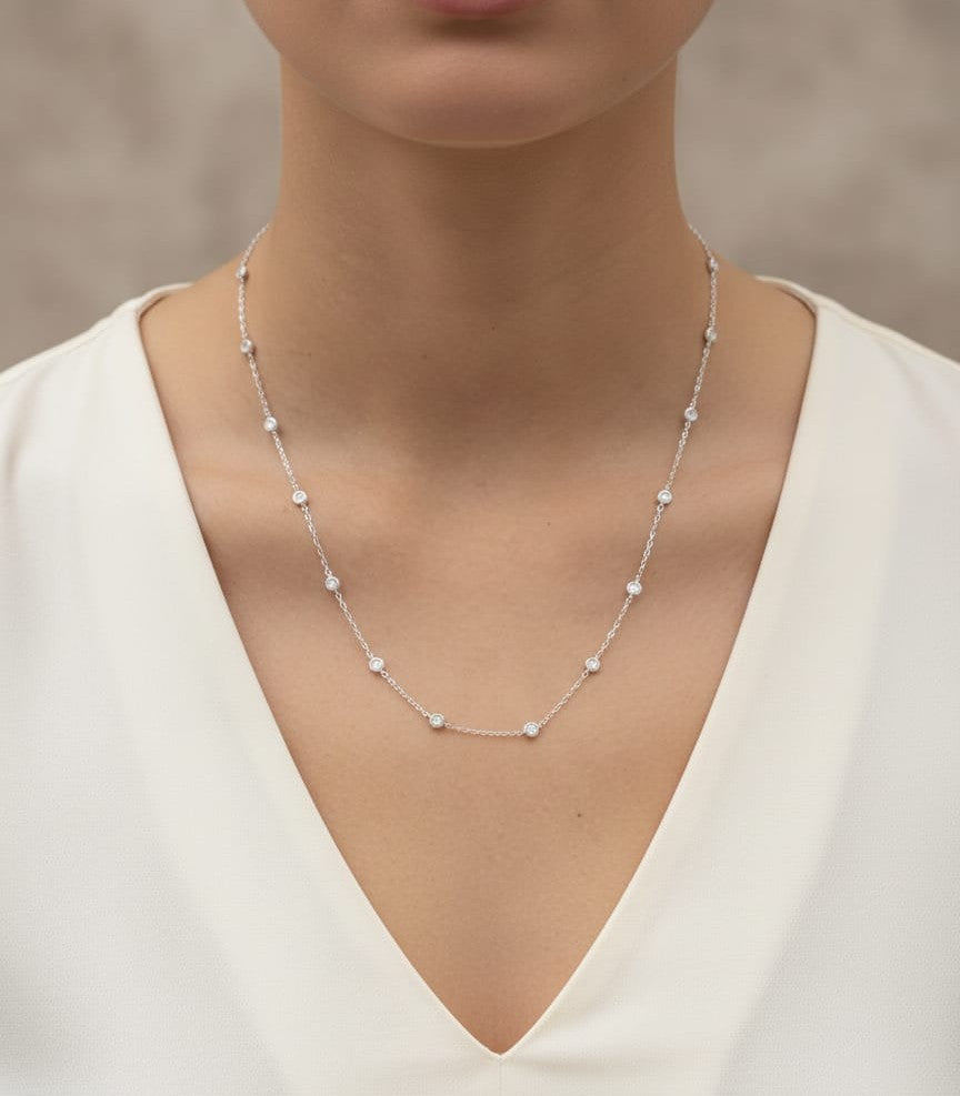 Diamond station necklace in 18K white gold with 0.60ct bezel-set diamonds – Emirates Diamonds