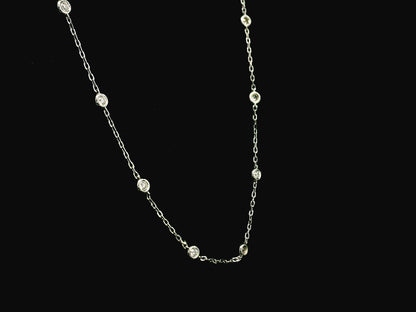 Diamond station necklace in 18K white gold with 0.60ct bezel-set diamonds – Emirates Diamonds
