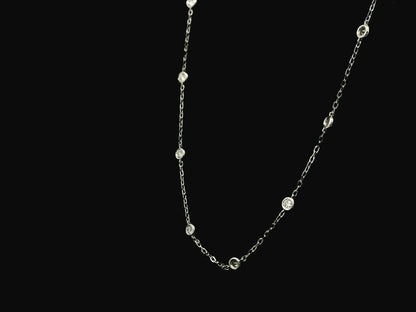 Diamond station necklace in 18K white gold with 0.60ct bezel-set diamonds – Emirates Diamonds