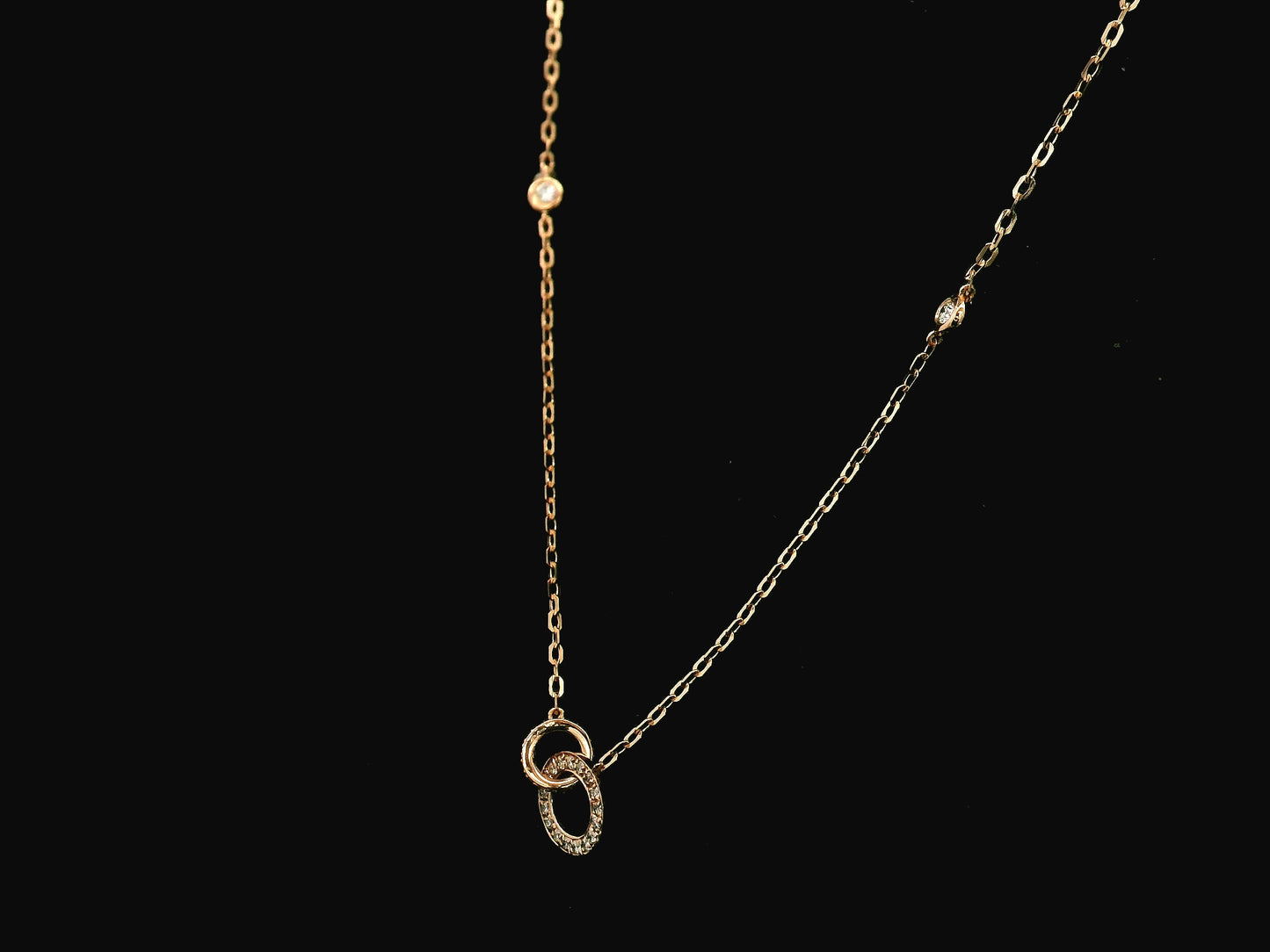 18K rose gold interlocking circle diamond necklace 0.22 carat with diamond chain accents – Emirates Diamonds