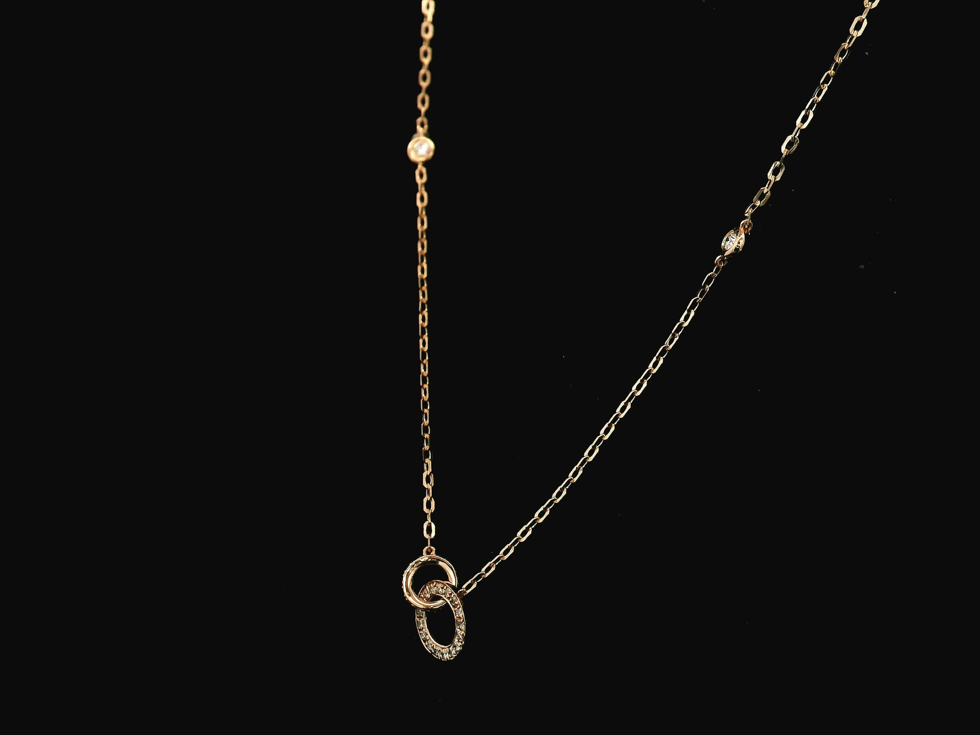 18K rose gold interlocking circle diamond necklace 0.22 carat with diamond chain accents – Emirates Diamonds