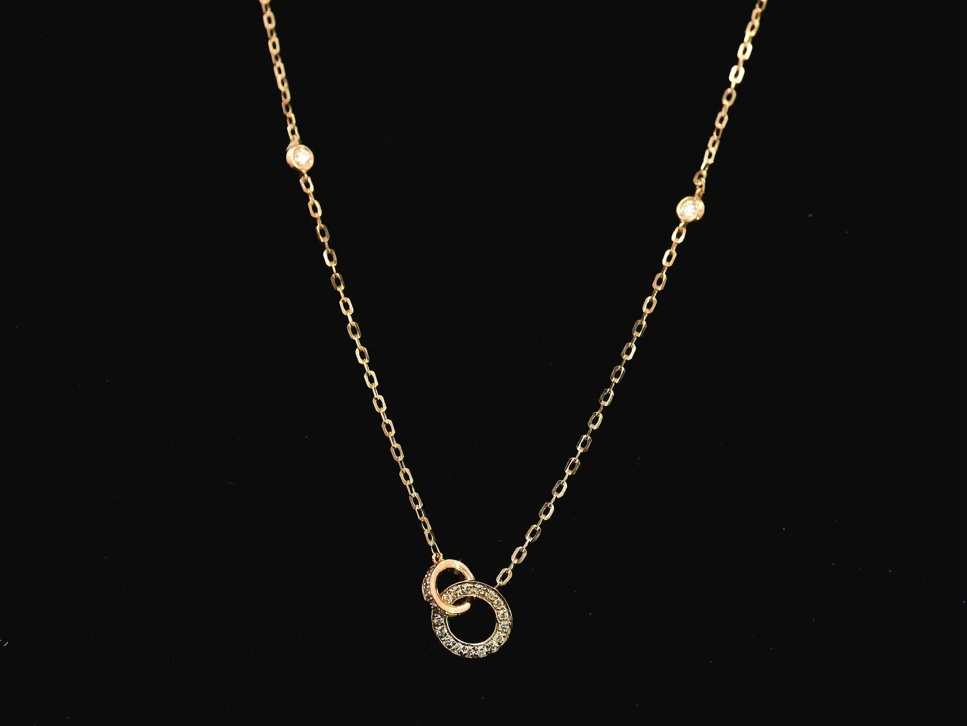18K rose gold interlocking circle diamond necklace 0.22 carat with diamond chain accents – Emirates Diamonds