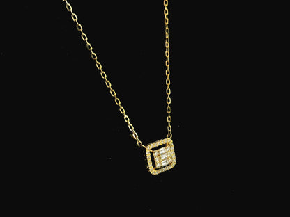 Baguette and round diamond halo pendant necklace in 18K yellow gold