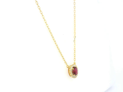 Oval ruby diamond halo pendant necklace in 18K yellow gold