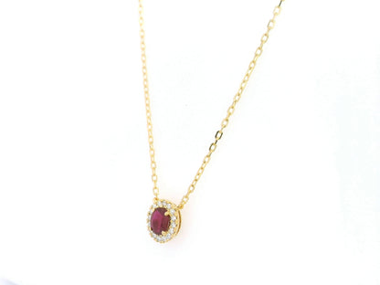 Oval ruby diamond halo pendant necklace in 18K yellow gold