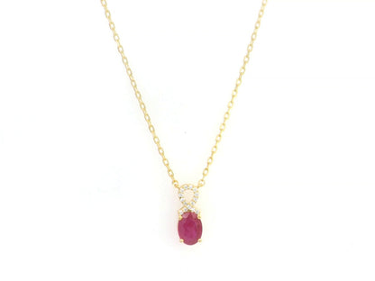 18K yellow gold ruby diamond pendant necklace 0.87 carat oval ruby with diamond loop – Emirates Diamonds