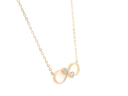 18K rose gold infinity heart necklace with pavé diamonds and double heart design.
