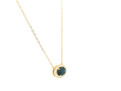 18K yellow gold sapphire and diamond halo pendant necklace with oval blue sapphire center stone