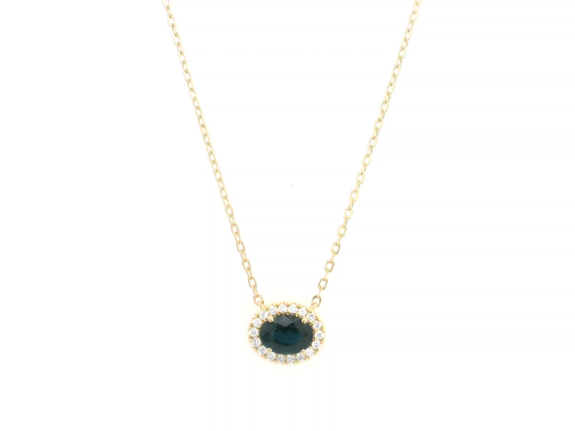 18K yellow gold sapphire and diamond halo pendant necklace with oval blue sapphire center stone