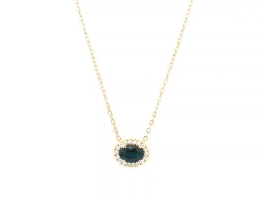 18K yellow gold sapphire and diamond halo pendant necklace with oval blue sapphire center stone