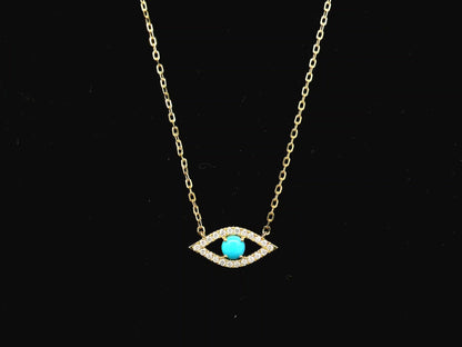 Turquoise and diamond evil eye pendant necklace in 18K yellow gold by Emirates Diamonds
