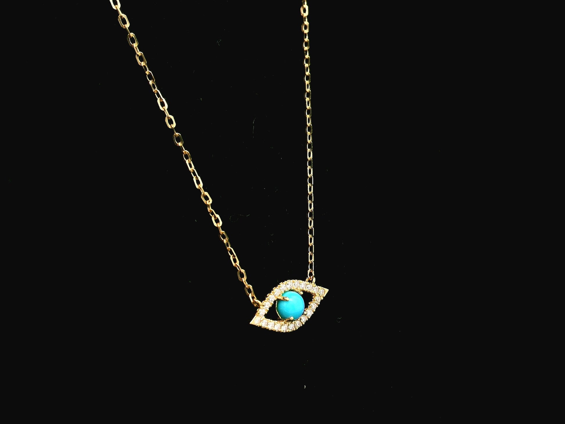 Turquoise and diamond evil eye pendant necklace in 18K yellow gold by Emirates Diamonds