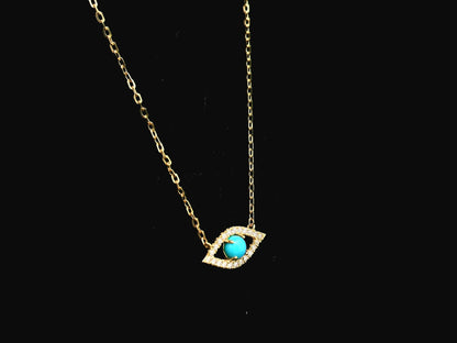 Turquoise and diamond evil eye pendant necklace in 18K yellow gold by Emirates Diamonds