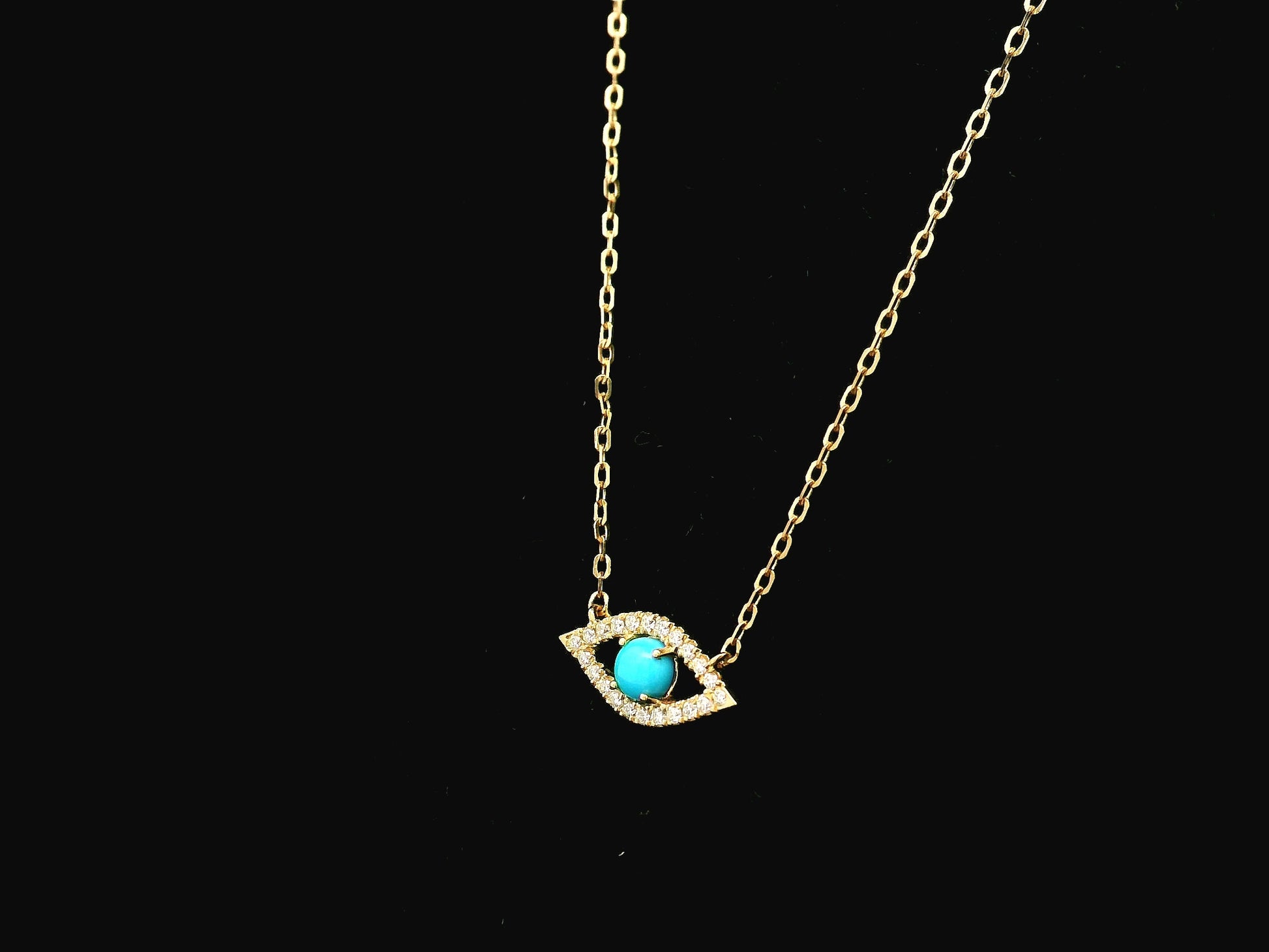 Turquoise and diamond evil eye pendant necklace in 18K yellow gold by Emirates Diamonds