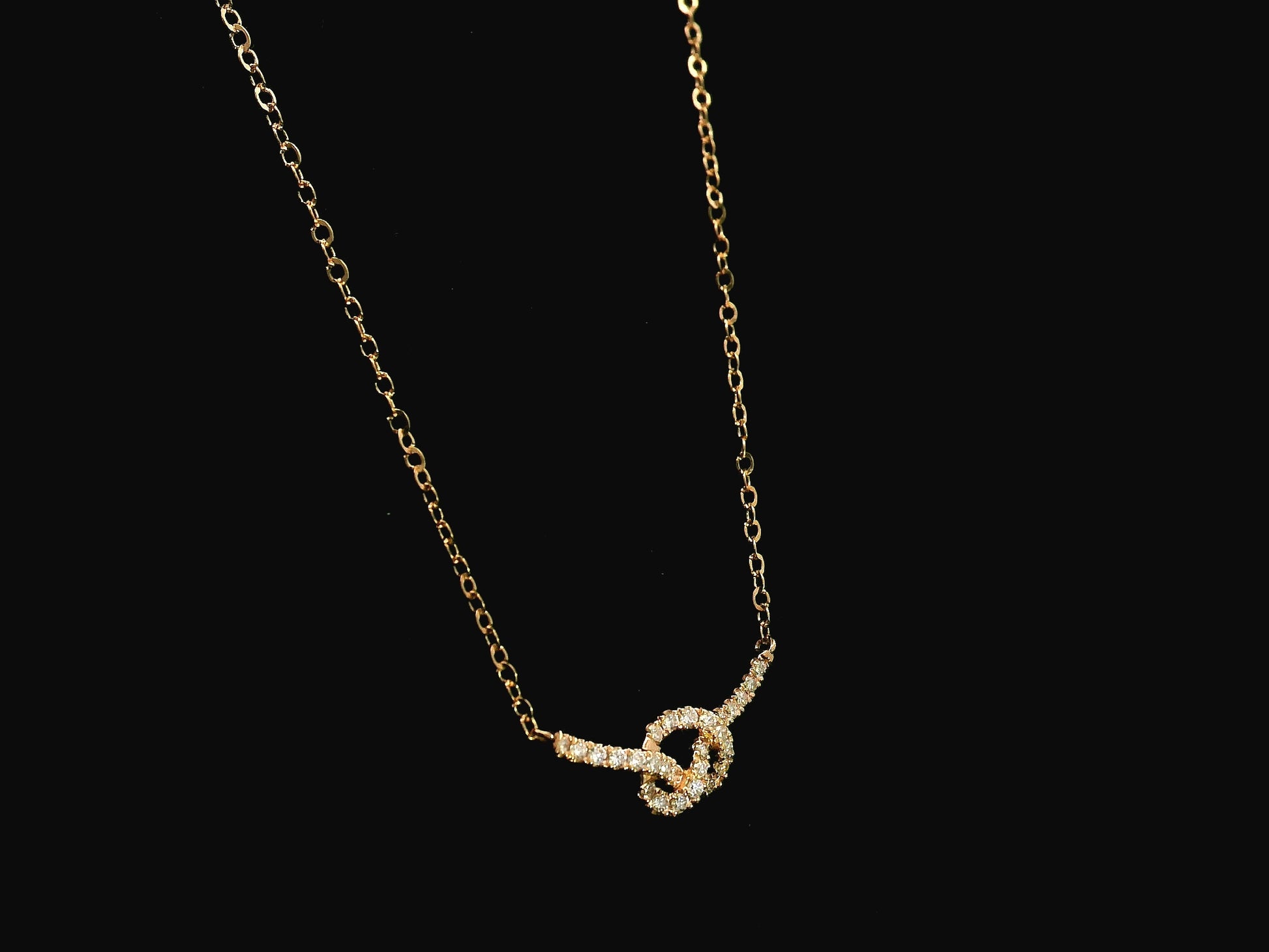 Diamond knot necklace in 18K rose gold with 0.29 carat natural diamonds