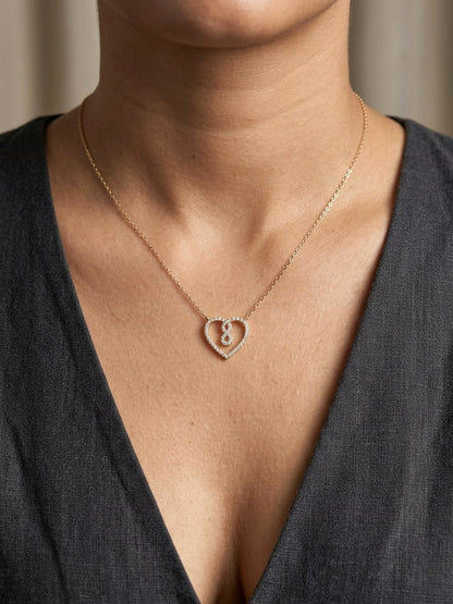 Diamond infinity heart pendant necklace in 18K yellow gold by Emirates Diamonds