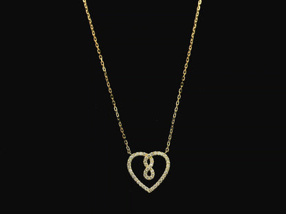 Diamond infinity heart pendant necklace in 18K yellow gold by Emirates Diamonds