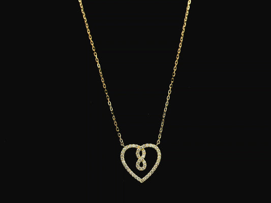 Diamond infinity heart pendant necklace in 18K yellow gold by Emirates Diamonds