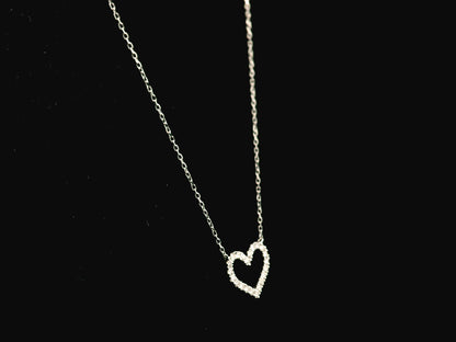 18K white gold open heart diamond necklace featuring 0.20 carat natural diamonds in a delicate pavé setting.