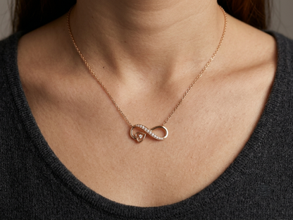 18K rose gold infinity heart diamond necklace featuring 0.13 Carat of natural diamonds in a timeless romantic design.