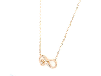 18K rose gold infinity heart diamond necklace featuring 0.13 Carat of natural diamonds in a timeless romantic design.