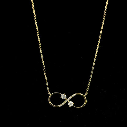 18K yellow gold infinity diamond necklace with round natural diamonds and pavé-set infinity pendant, handcrafted fine jewellery by Emirates Diamonds.