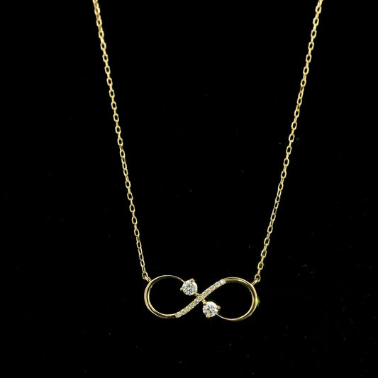 18K yellow gold infinity diamond necklace with round natural diamonds and pavé-set infinity pendant, handcrafted fine jewellery by Emirates Diamonds.