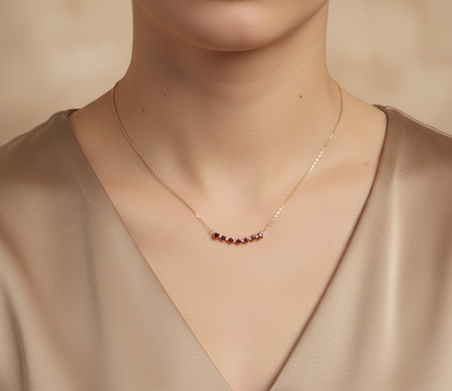 18K yellow gold ruby and diamond bar necklace with square-cut rubies by Emirates Diamonds