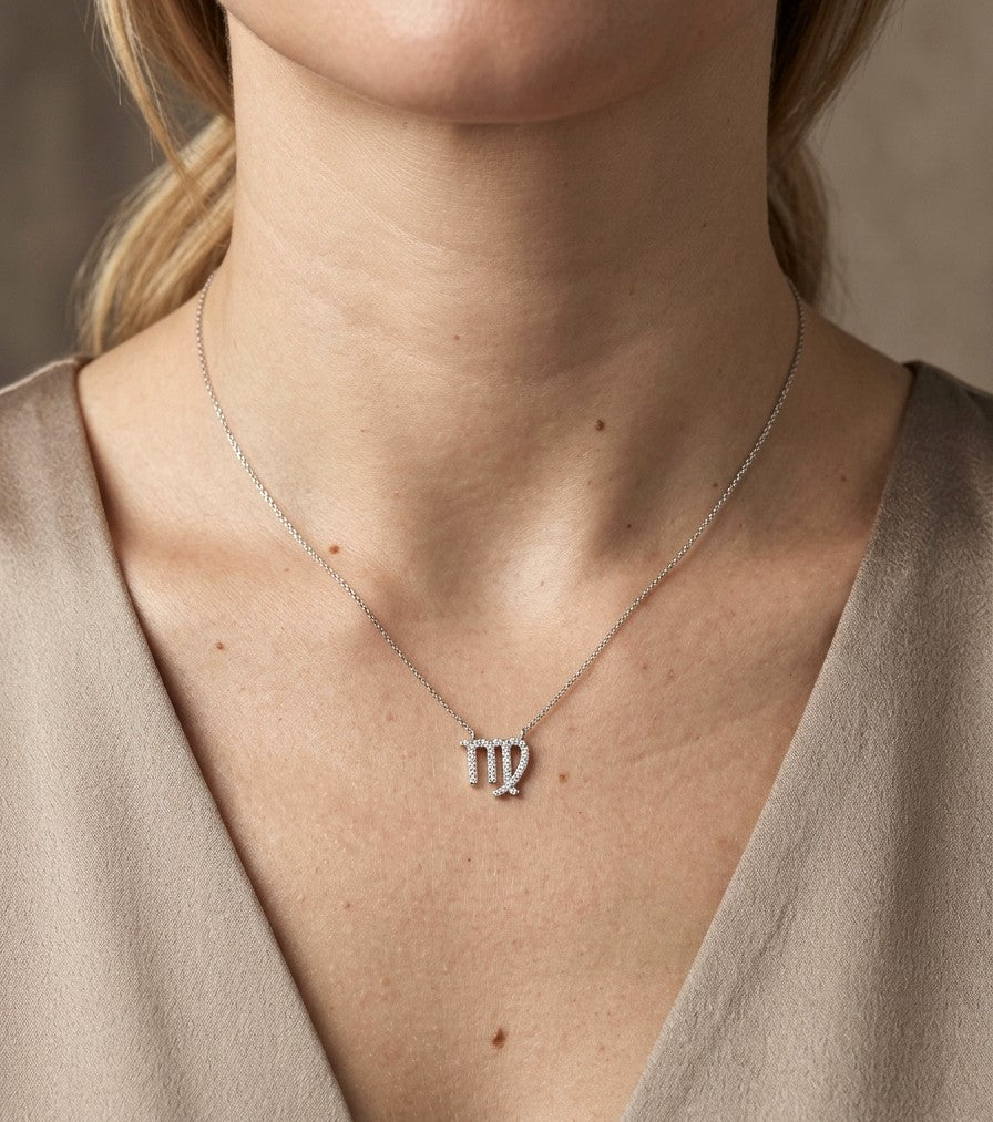 Virgo zodiac necklace in 18K white gold featuring a natural diamond-set Virgo symbol pendant suspended from a delicate white gold chain.