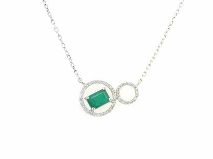 18K white gold necklace featuring a 0.63ct emerald-cut emerald and 0.15ct diamond double-circle pendant, designed for modern elegance and layering versatility