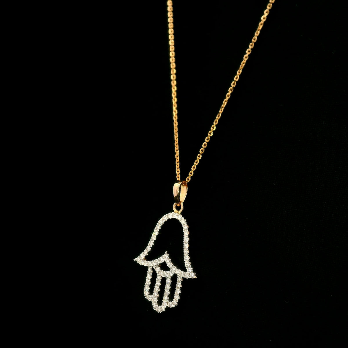 Diamond Hamsa hand pendant in 18K rose gold with openwork design