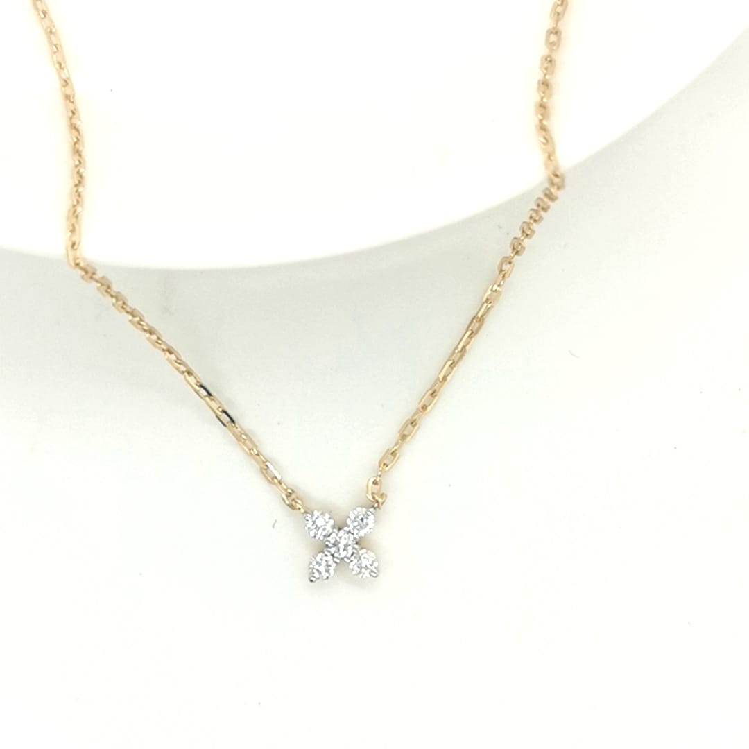 This Stunning Pendant Features Five Dazzling Diamonds Set In A Sleek And Elegant Design. The Pendant Hangs From A 18k Chain. A Perfect Blend Of Sophistication And Luxury, This Pendant Is A Timeless Accessory That Adds A Touch Of Brilliance To Any Outfit.