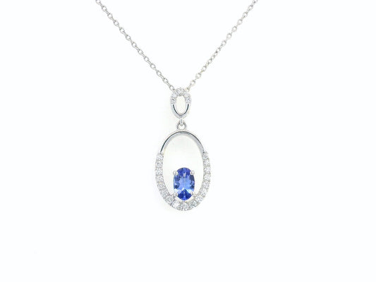 18K white gold tanzanite and diamond oval pendant featuring a 0.47ct violet-blue tanzanite and 0.21ct diamonds, designed for layering