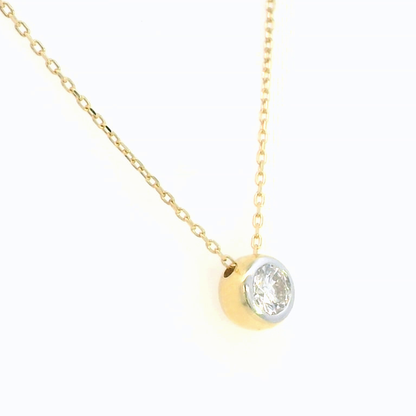 0.26 Carat Solitaire Diamond Pendant in 18K Yellow Gold with Bezel Setting.