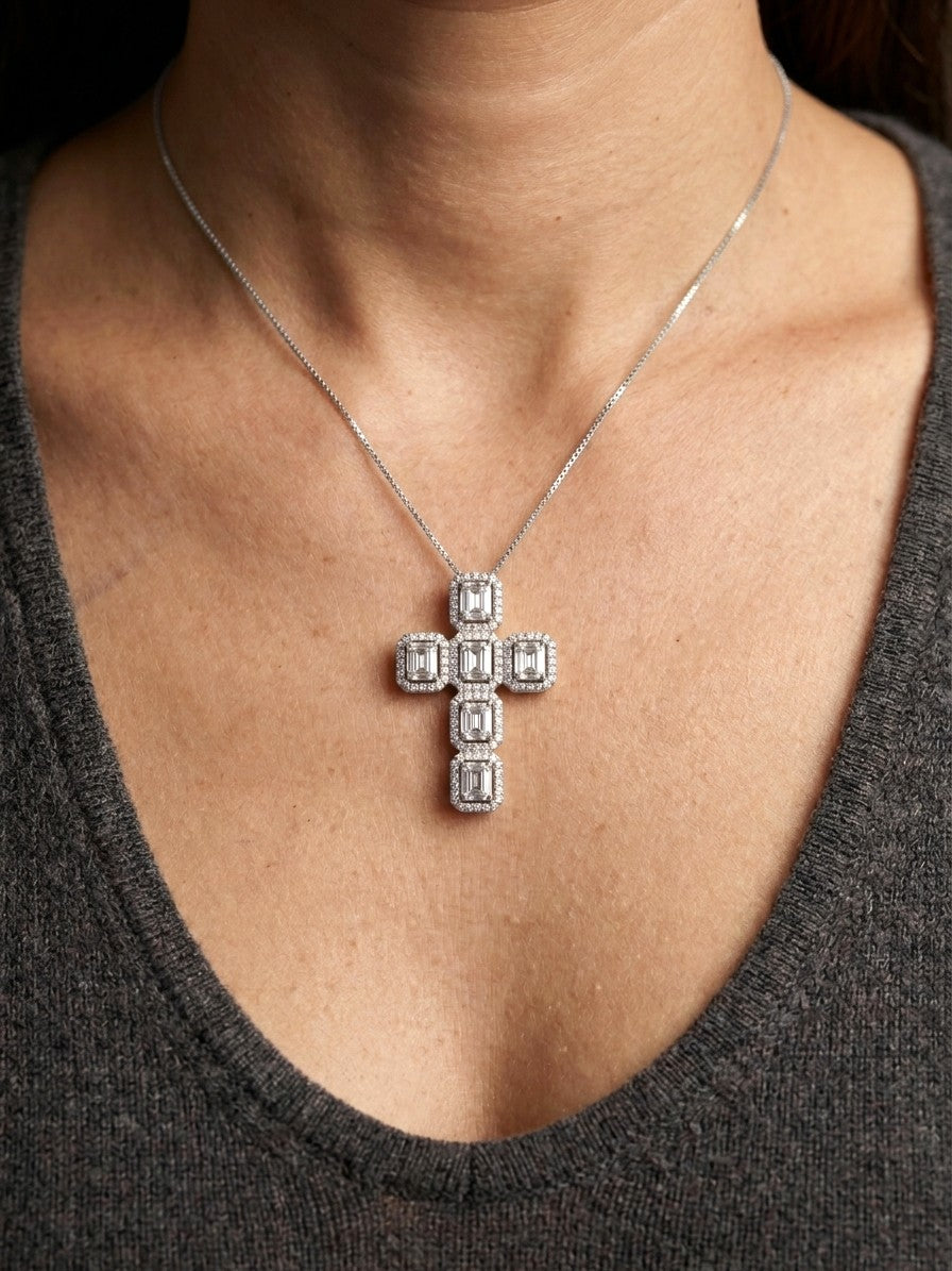 18K white gold cross pendant set with baguette and round brilliant diamonds, 1.41 carat total diamond weight