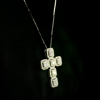 18K white gold cross pendant set with baguette and round brilliant diamonds, 1.41 carat total diamond weight