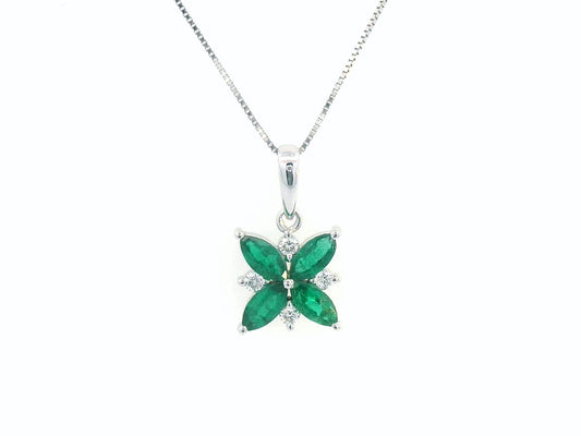 18K gold floral pendant featuring 0.57 CT natural emeralds and 0.07 CT diamonds, designed in a delicate flower shape. Chain not included.