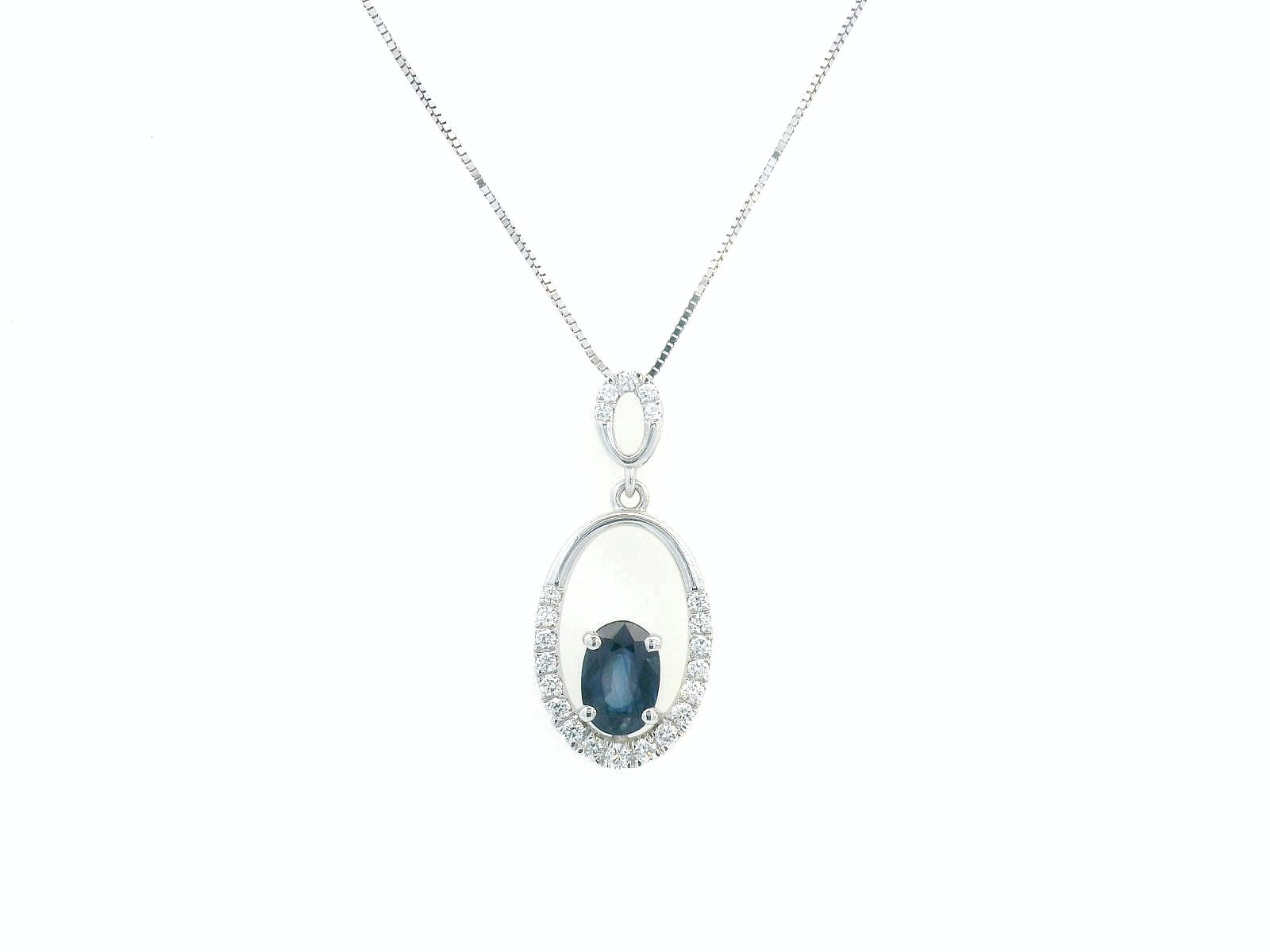 18K white gold oval pendant featuring a 0.70 carat sapphire with 0.15 carats of diamonds