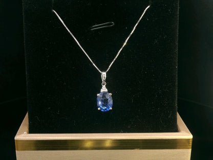 18K gold oval sapphire pendant with 1.95 Ct blue sapphire and 0.03 Ct diamond accents, classic gemstone jewelry