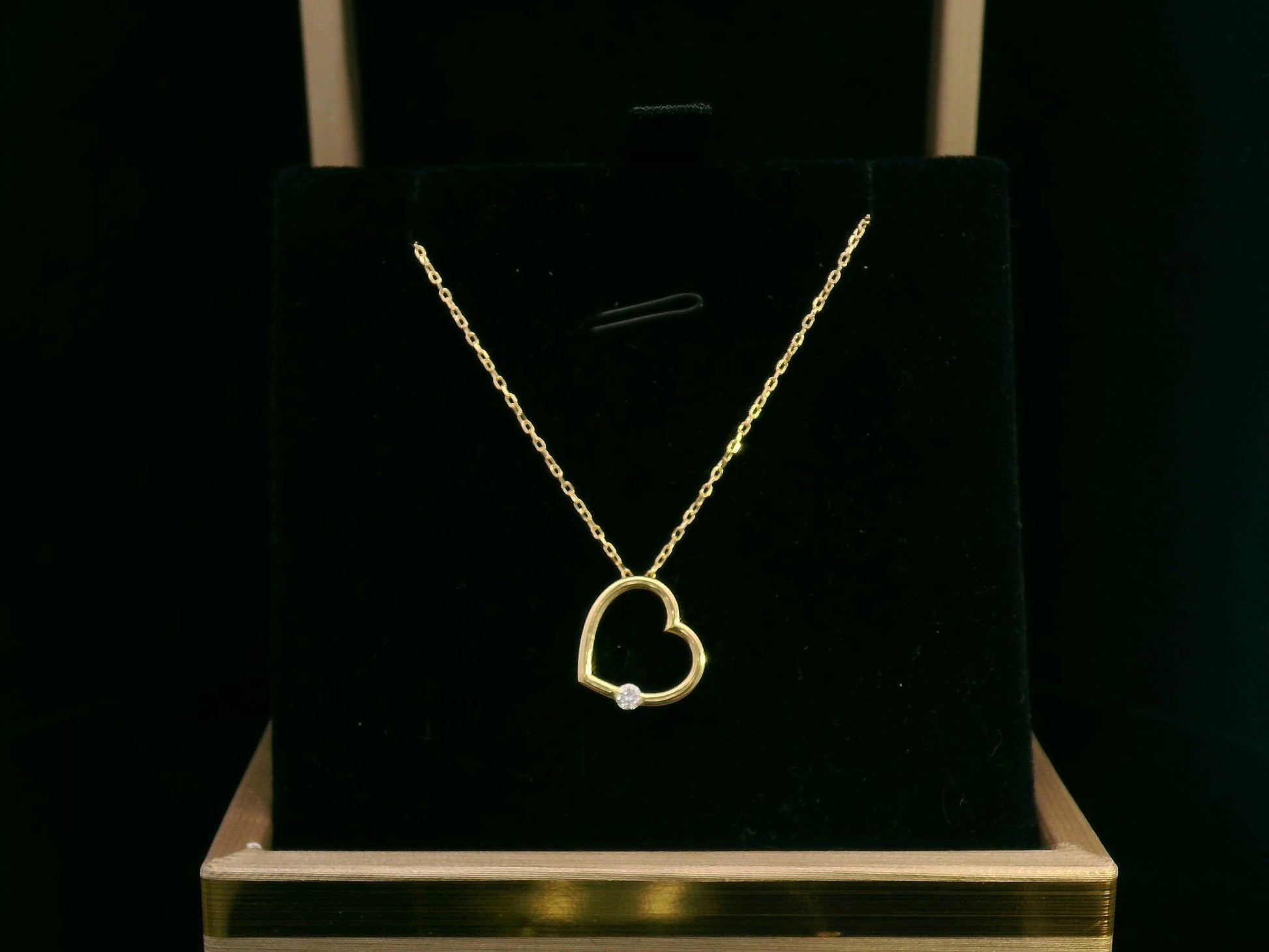 Minimalist 18K gold open heart necklace with 0.04 Ct diamond pendant, elegant and timeless jewelry gift