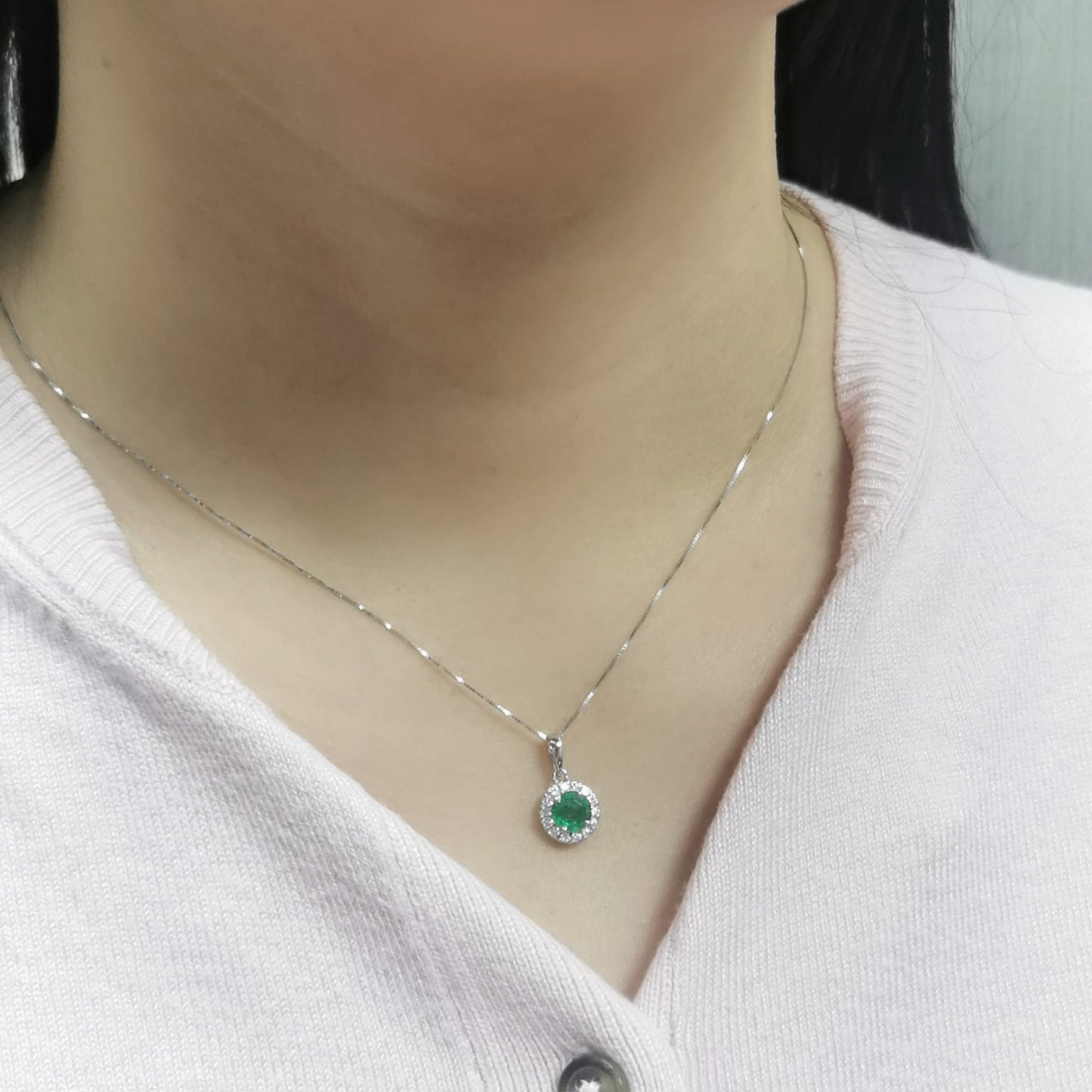 18K white gold emerald pendant with 0.60ct emerald and 0.17ct diamond halo, classic and elegant fine jewelry.