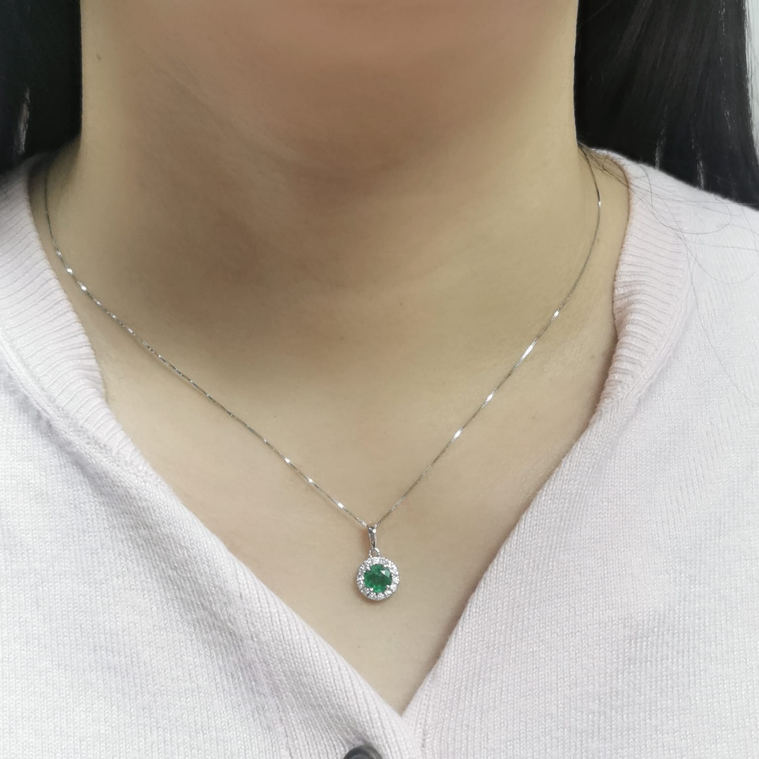 18K white gold emerald pendant with 0.60ct emerald and 0.17ct diamond halo, classic and elegant fine jewelry.