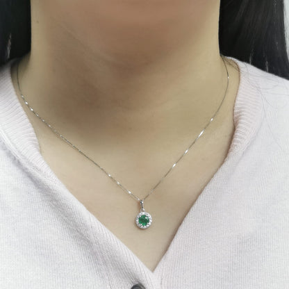 18K white gold emerald pendant with 0.60ct emerald and 0.17ct diamond halo, classic and elegant fine jewelry.